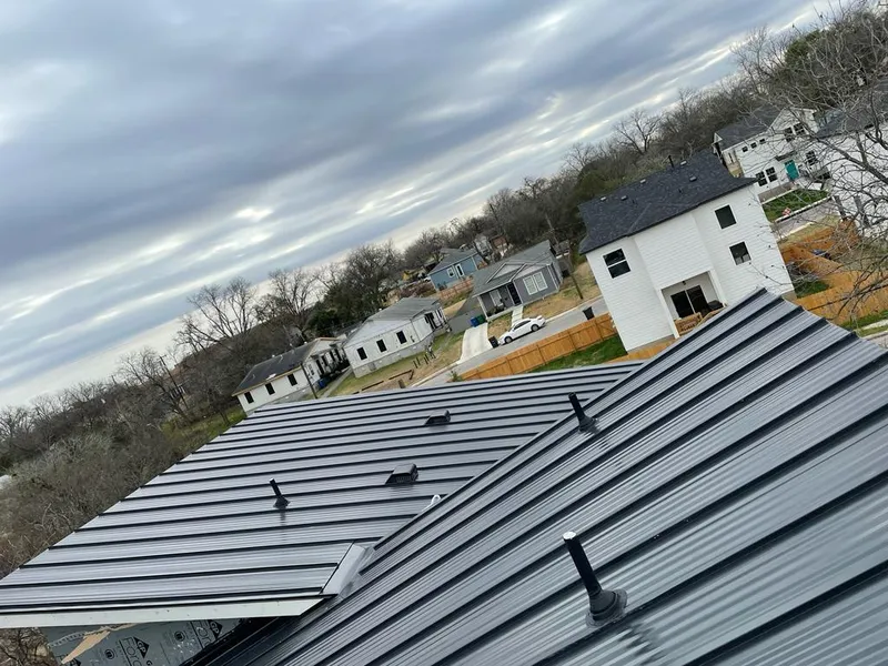 Standing seam metal roof panels with vents for Skylight Repair in Somers